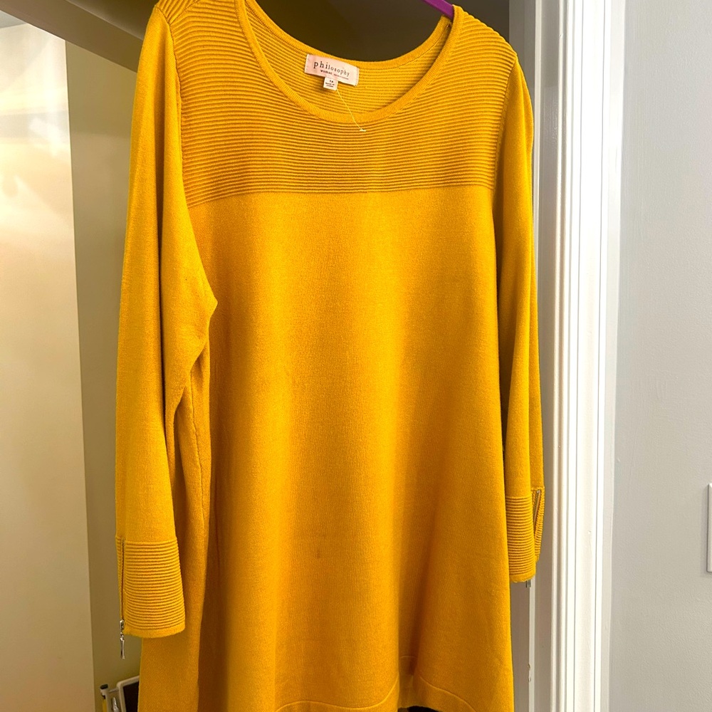 1X ladies gold sweater.
